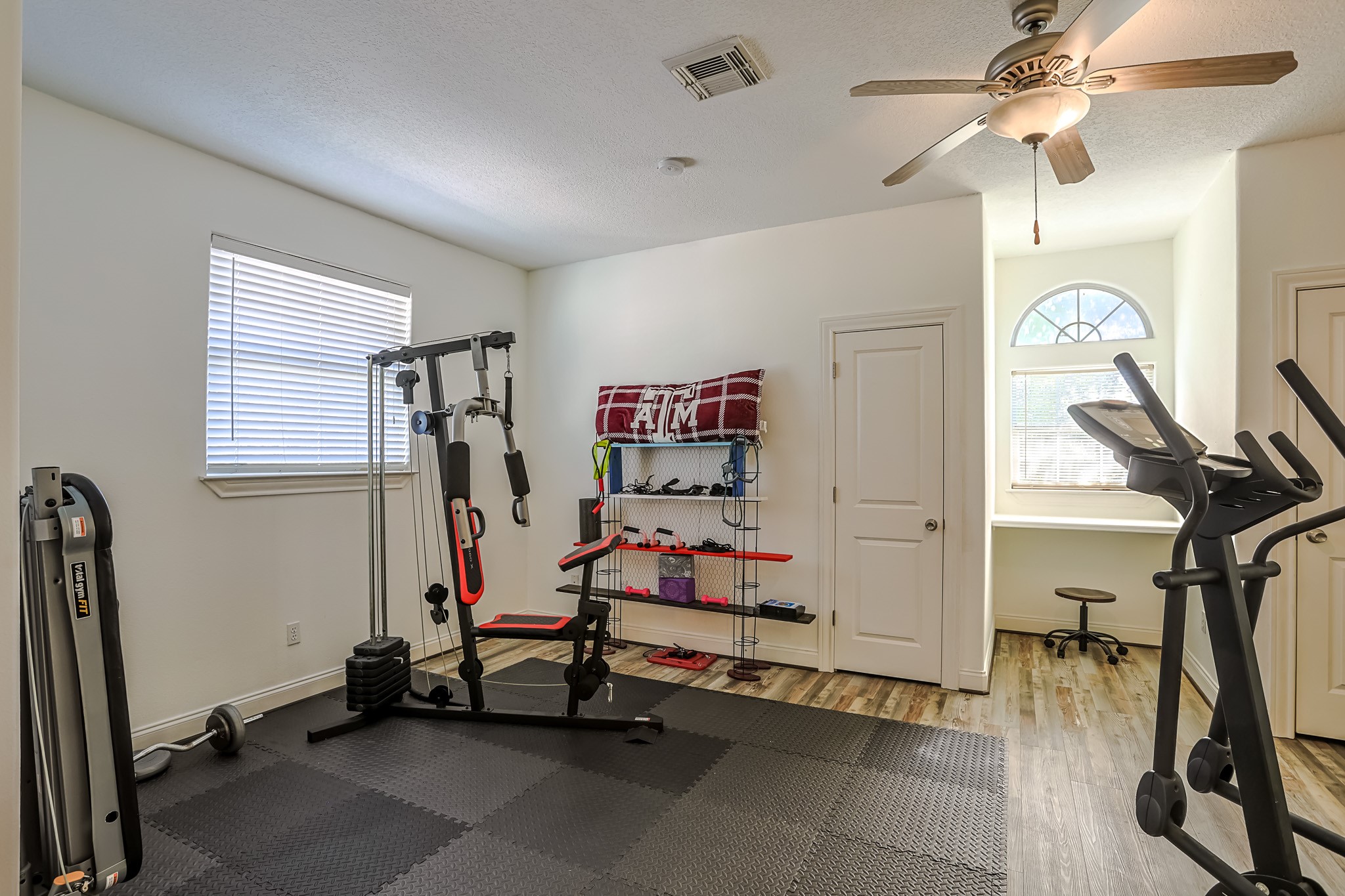 30119 West Geneva Drive Spring, TX 77386 - Photo 27 of 35 Spacious flex room currently used as a home gym, complete with closet and easy access to upstairs amenities