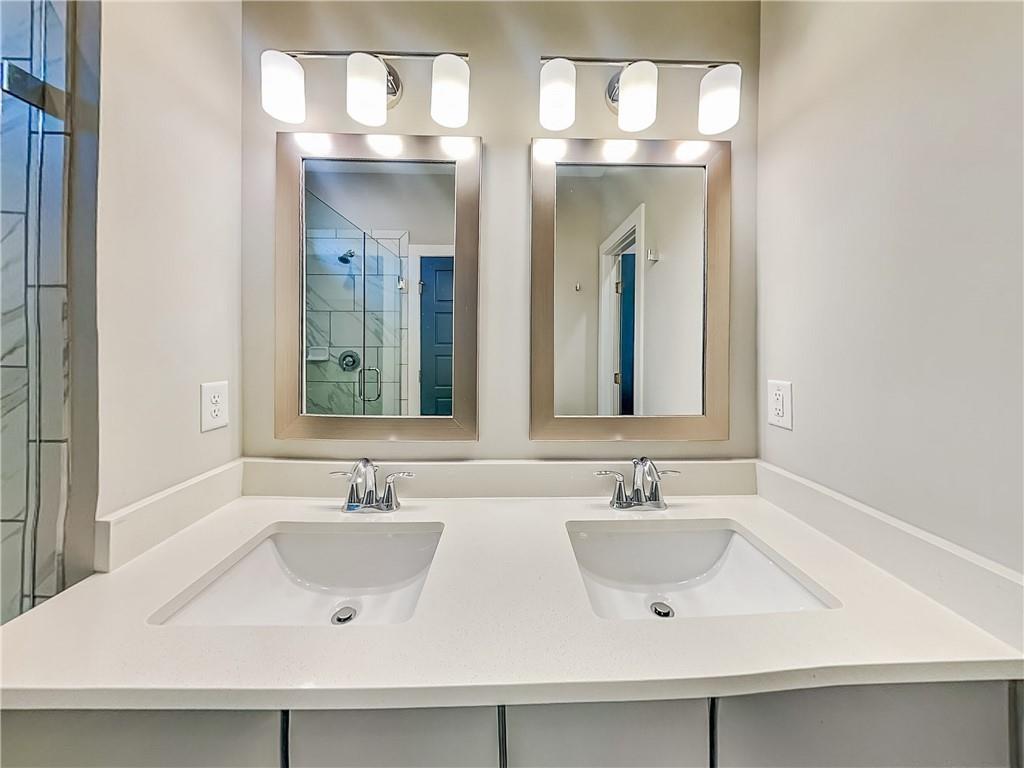 2038 Rockledge Road Northeast Atlanta, GA 30324 - Photo 9 of 21 a bathroom with a sink and a mirror