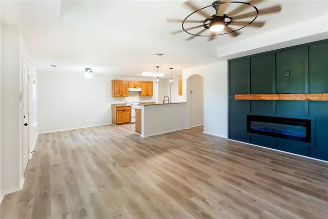 a view of a kitchen with a sink and dishwasher