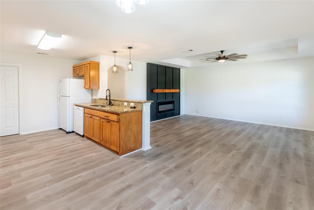 413 Bethlehem Street Terrell, TX 75160 - Photo 16 of 16 a view of kitchen with cabinets and wooden floor