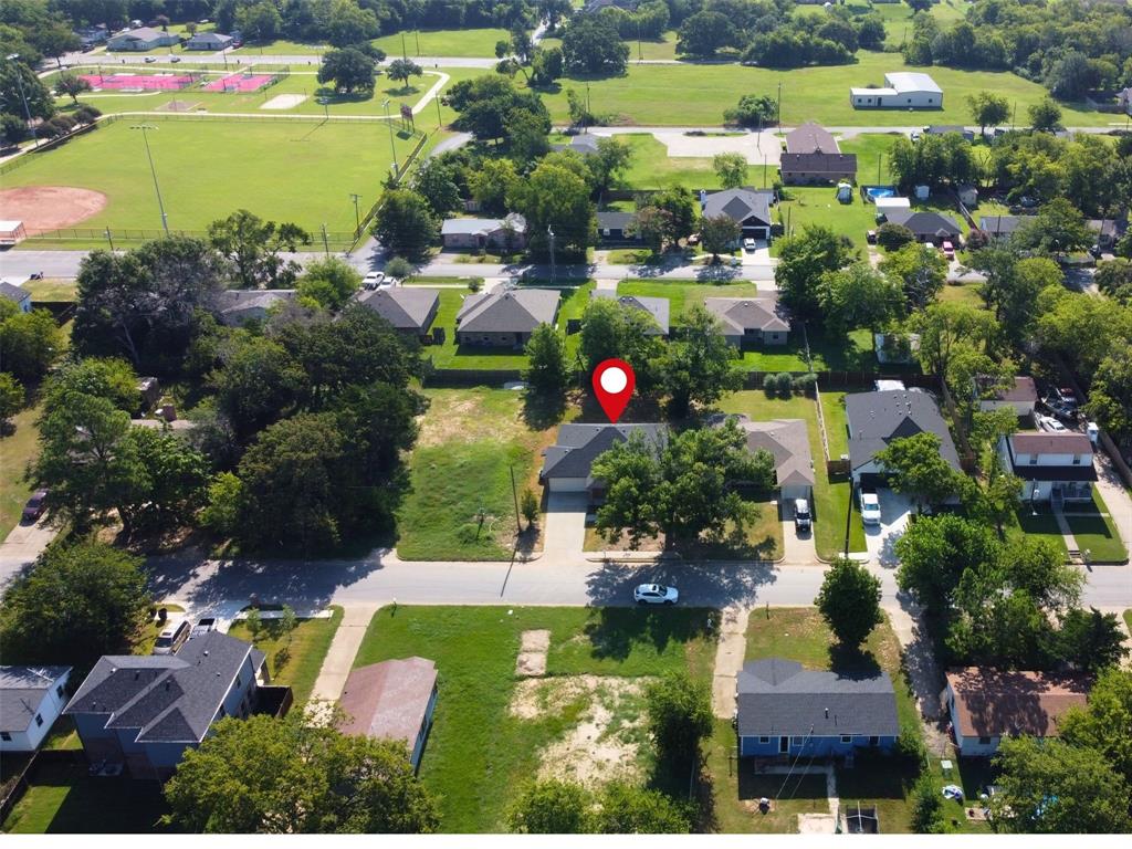 413 Bethlehem Street Terrell, TX 75160 - Photo 3 of 16 an aerial view of residential houses with outdoor space and swimming pool