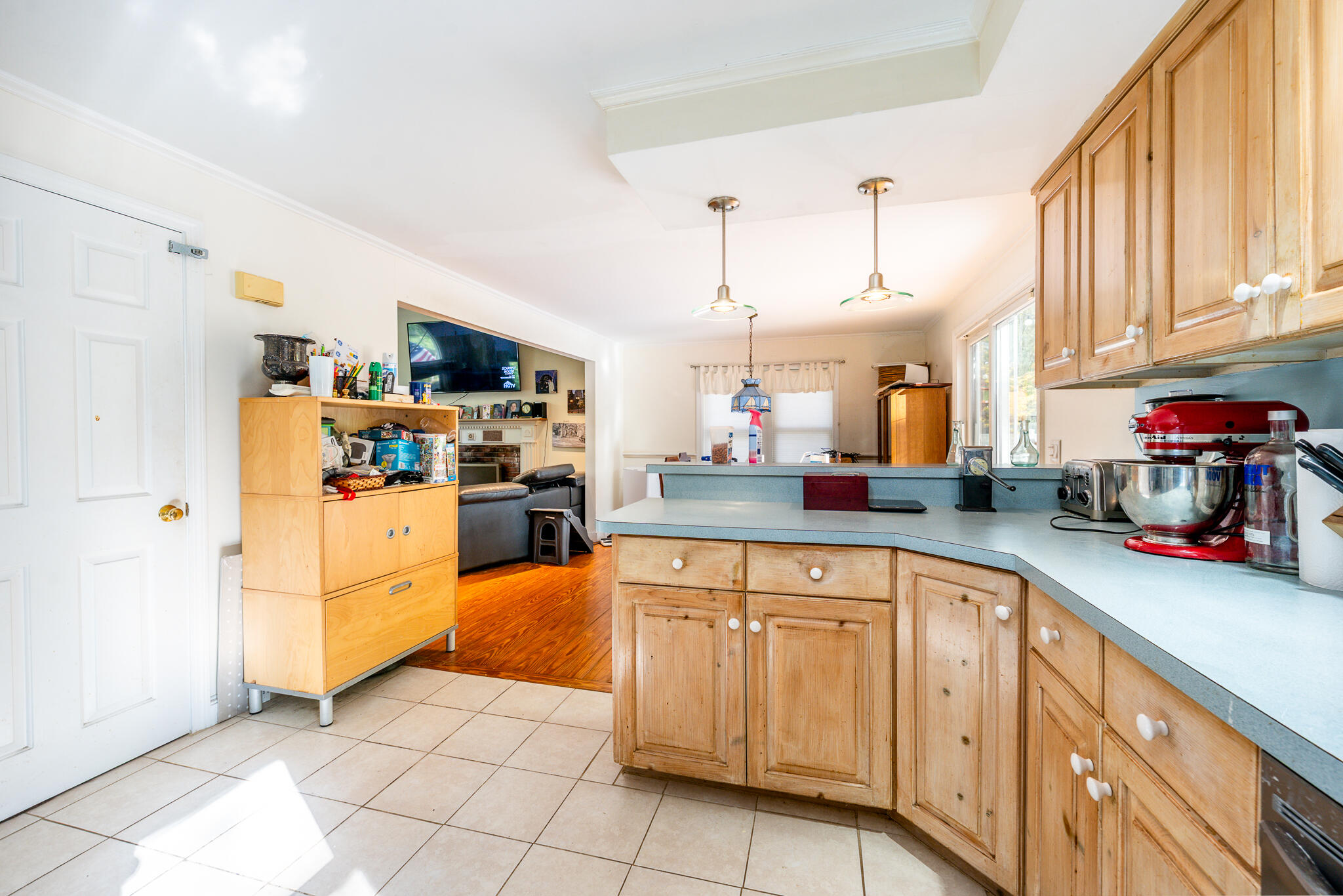 191 James Circle Mashpee, MA 02649 - Photo 7 of 12 a kitchen with stainless steel appliances granite countertop a sink and cabinets