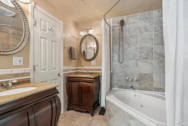 a bathroom with a sink a toilet and a bathtub