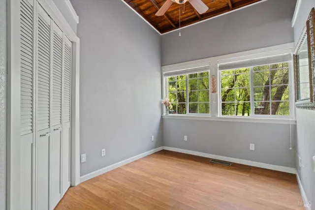 a view of a room with a large window