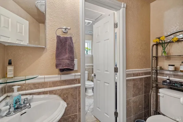 a bathroom with a sink and a toilet