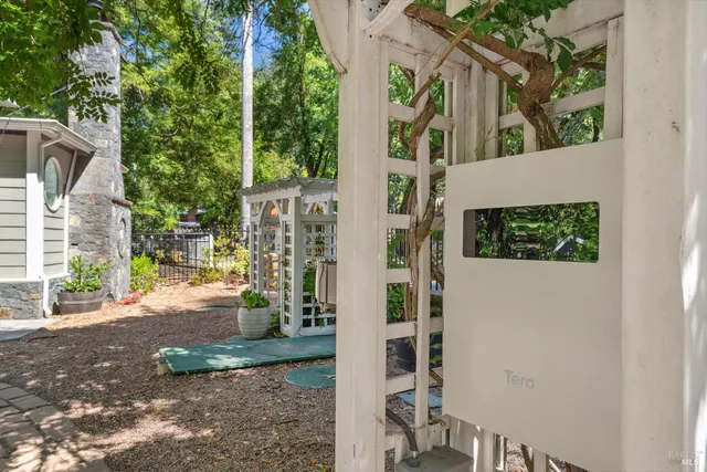 a backyard of a building with lots of green space