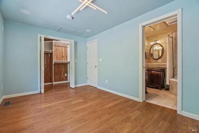 a view of a livingroom with wooden floor