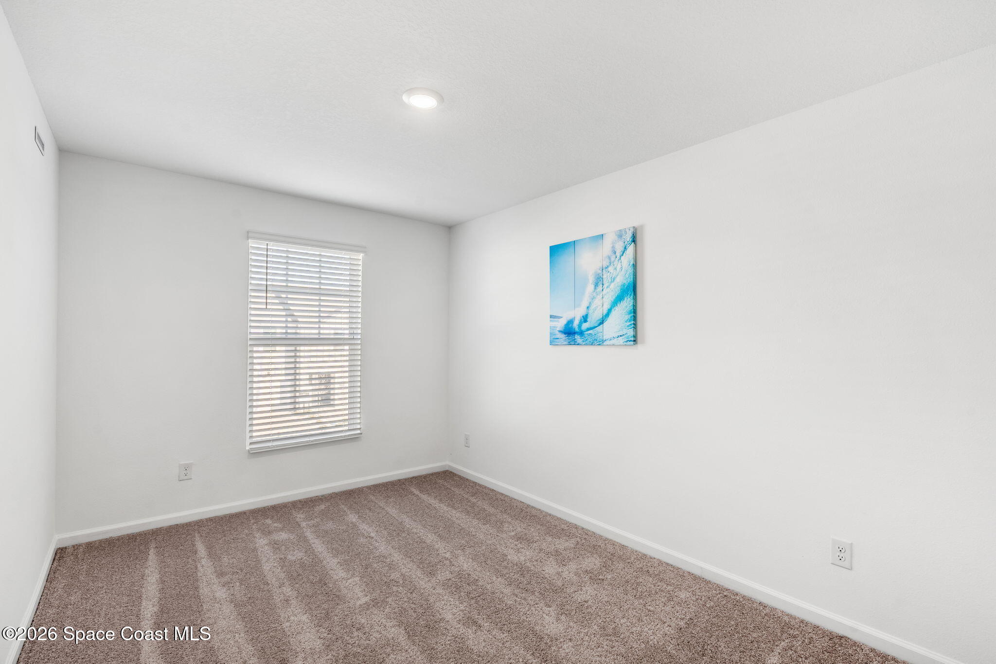 2117 Topsail Way Rockledge, FL 32955 - Photo 13 of 16 an empty room with windows