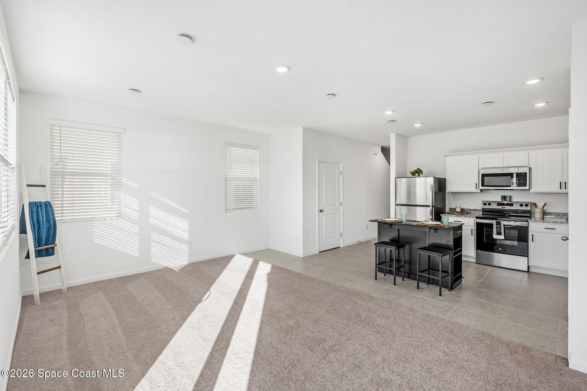 2117 Topsail Way Rockledge, FL 32955 - Photo 15 of 16 a view of kitchen with furniture and windows
