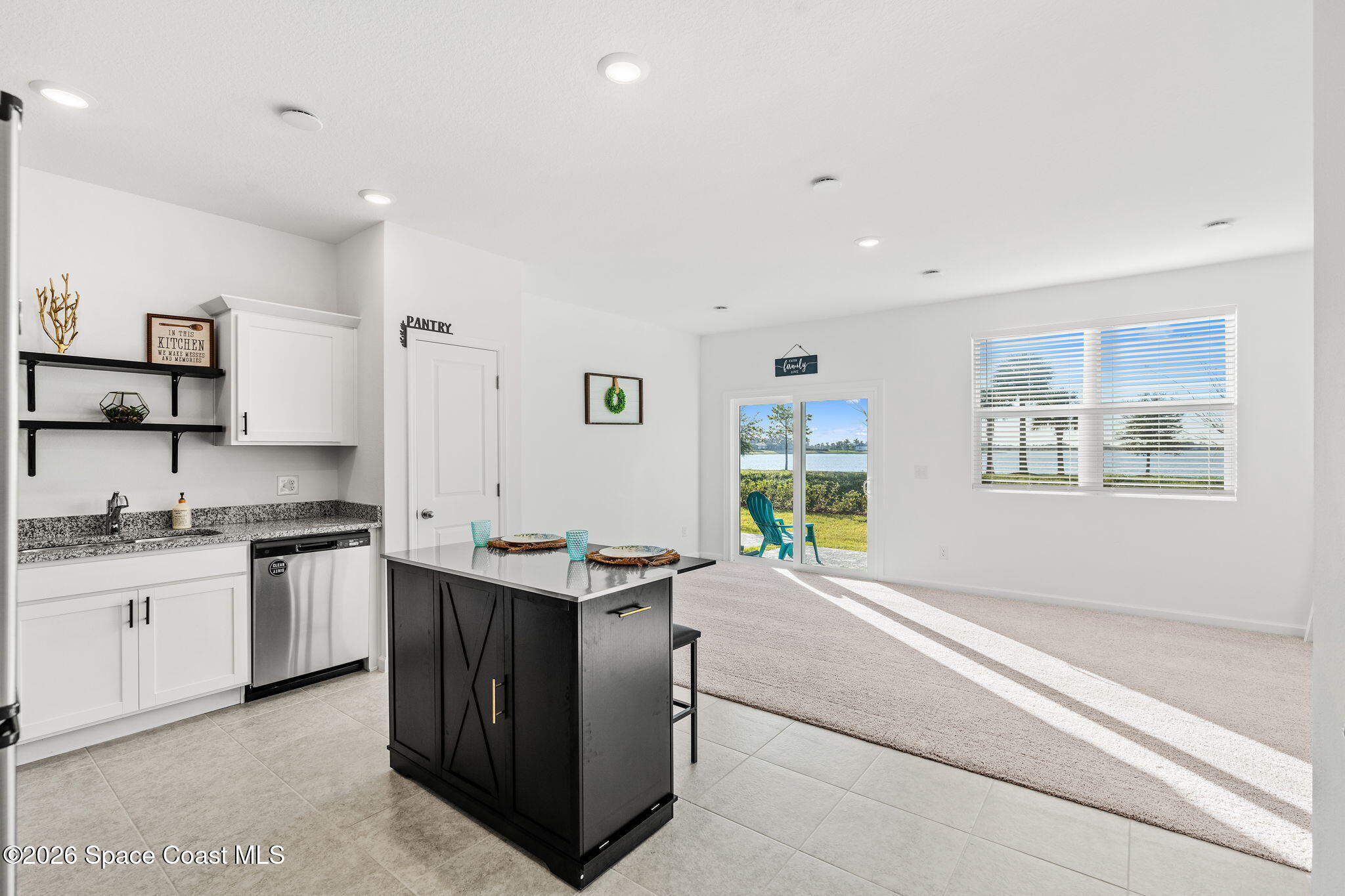 2117 Topsail Way Rockledge, FL 32955 - Photo 3 of 16 a kitchen with a stove and a sink