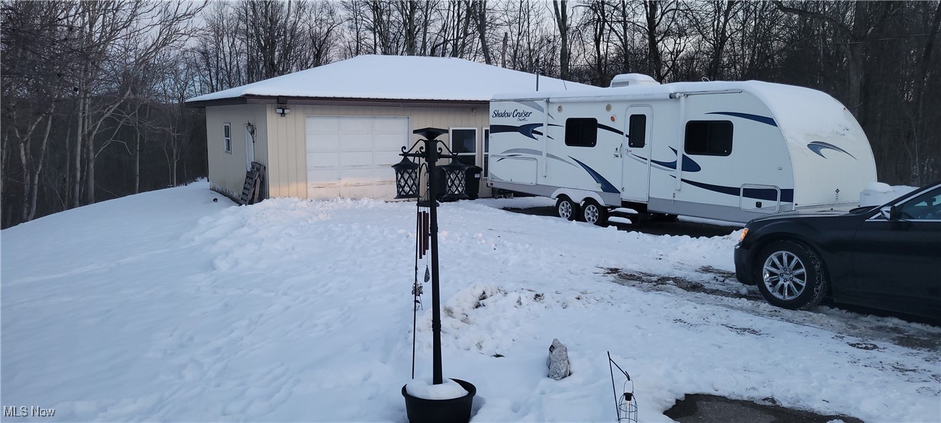 12980 Portie-Flamingo Road Corning, OH 43730 - Photo 2 of 30 View of snow covered structure