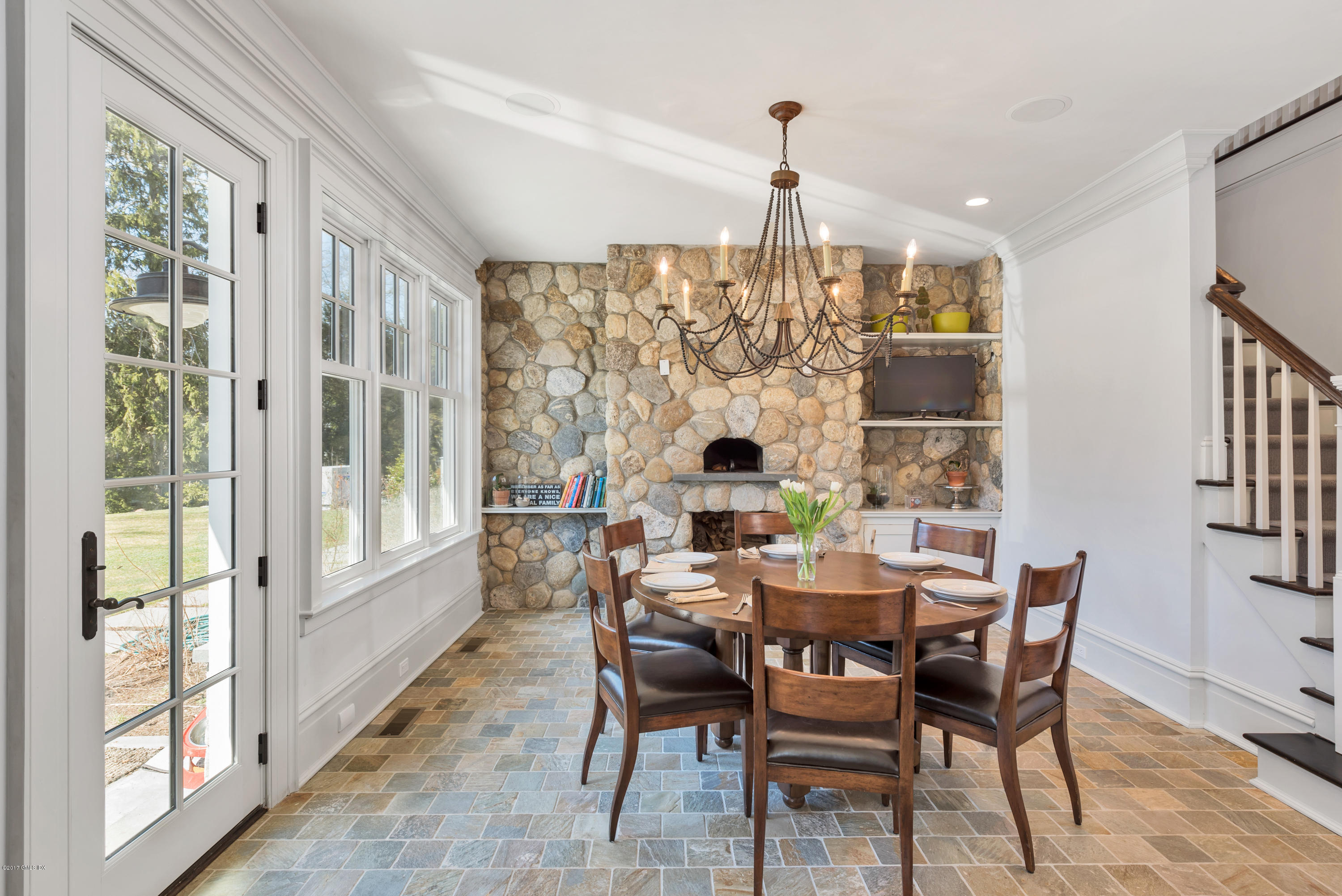 136 Parsonage Road Greenwich, CT 06830 - Photo 13 of 35 a view of a dining room with furniture window and outside view