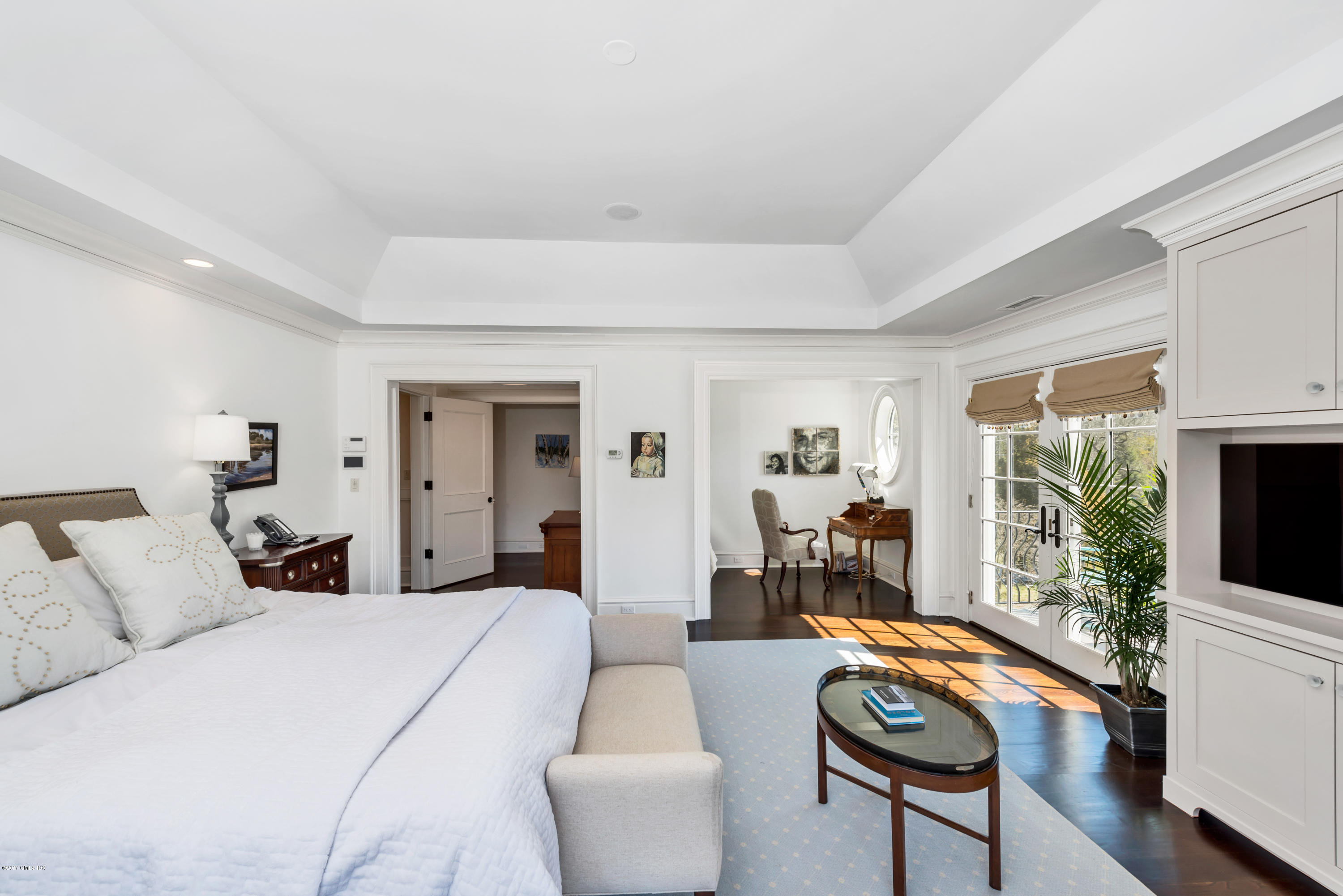 136 Parsonage Road Greenwich, CT 06830 - Photo 15 of 35 a living room with furniture and a large window