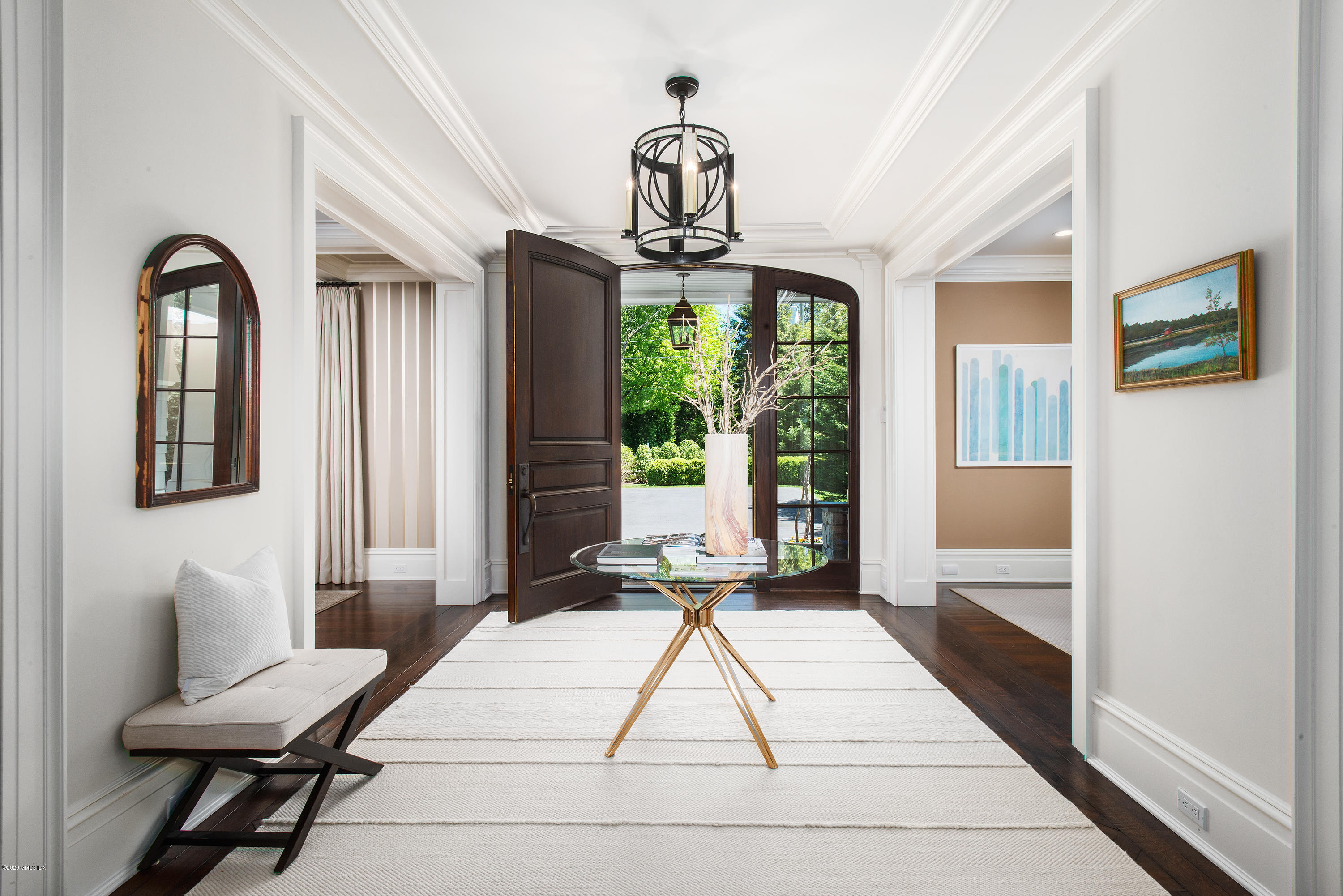 136 Parsonage Road Greenwich, CT 06830 - Photo 2 of 35 a bedroom with a bed and a window