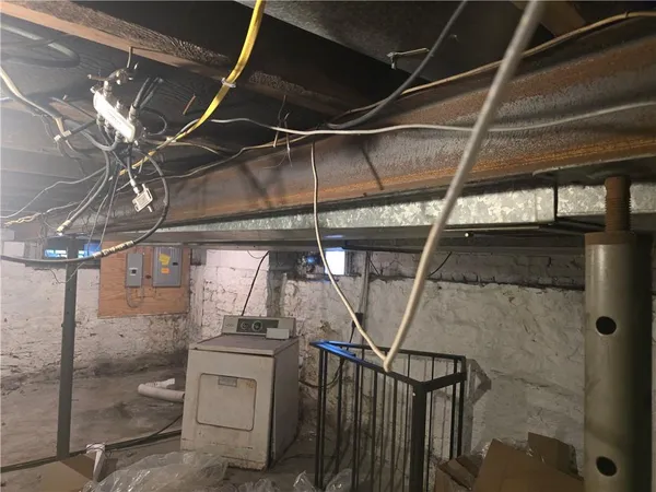 a view of a room with wooden racks