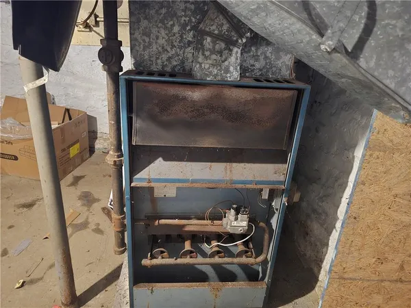 a kitchen with a sink stove and refrigerator