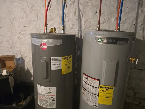 a bedroom with a bed and a mirror