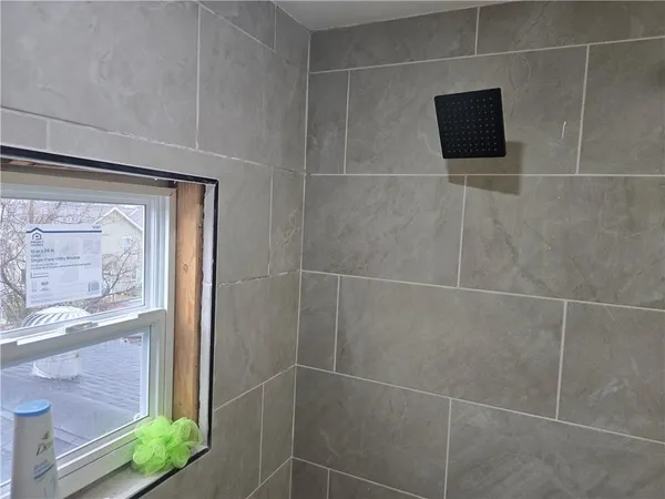 a view of a livingroom with wooden floor and closet