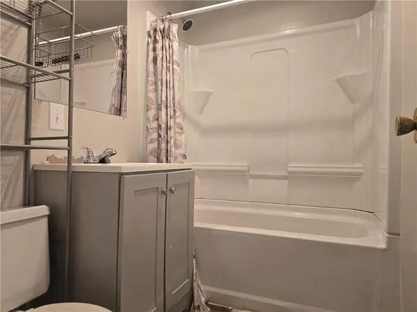 a view of a livingroom with wooden floor