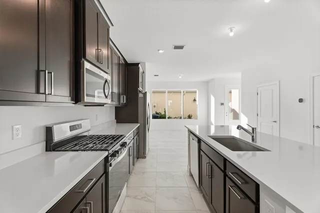 a view of a back yard of the house