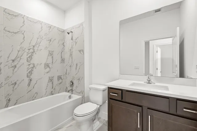 a picture of a book and a bed