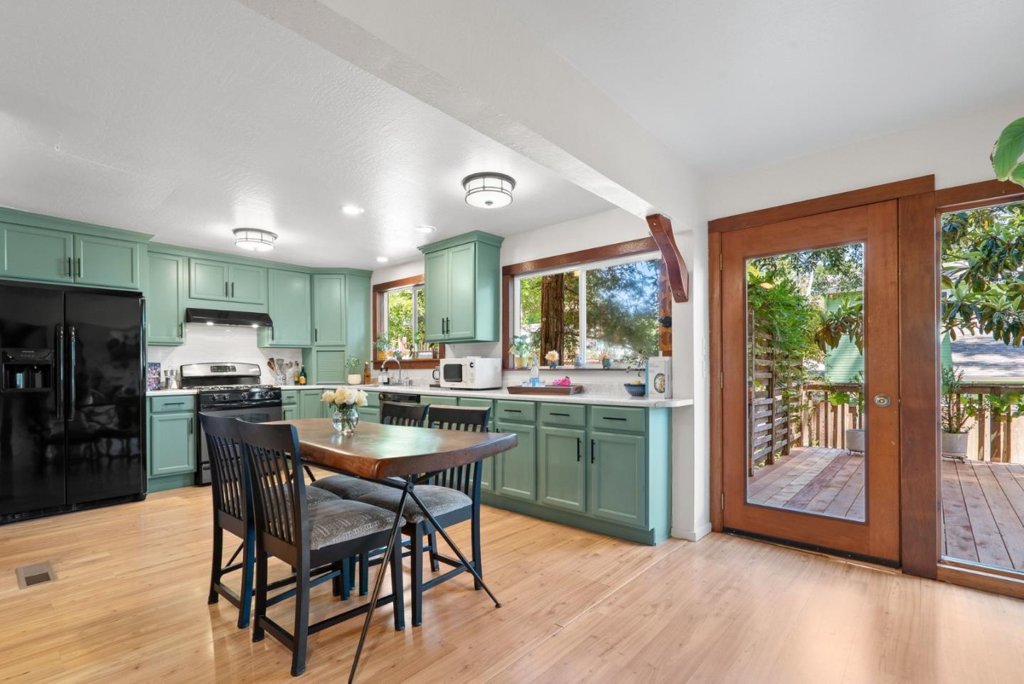 280 Main Street Ben Lomond, CA 95005 - Photo 13 of 47 a kitchen with a table and chairs in it