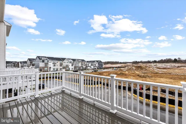 a view of a balcony with city view