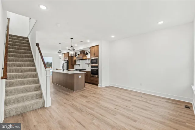 a view of a kitchen with kitchen and microwave