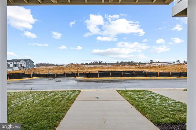 a view of swimming pool with furniture