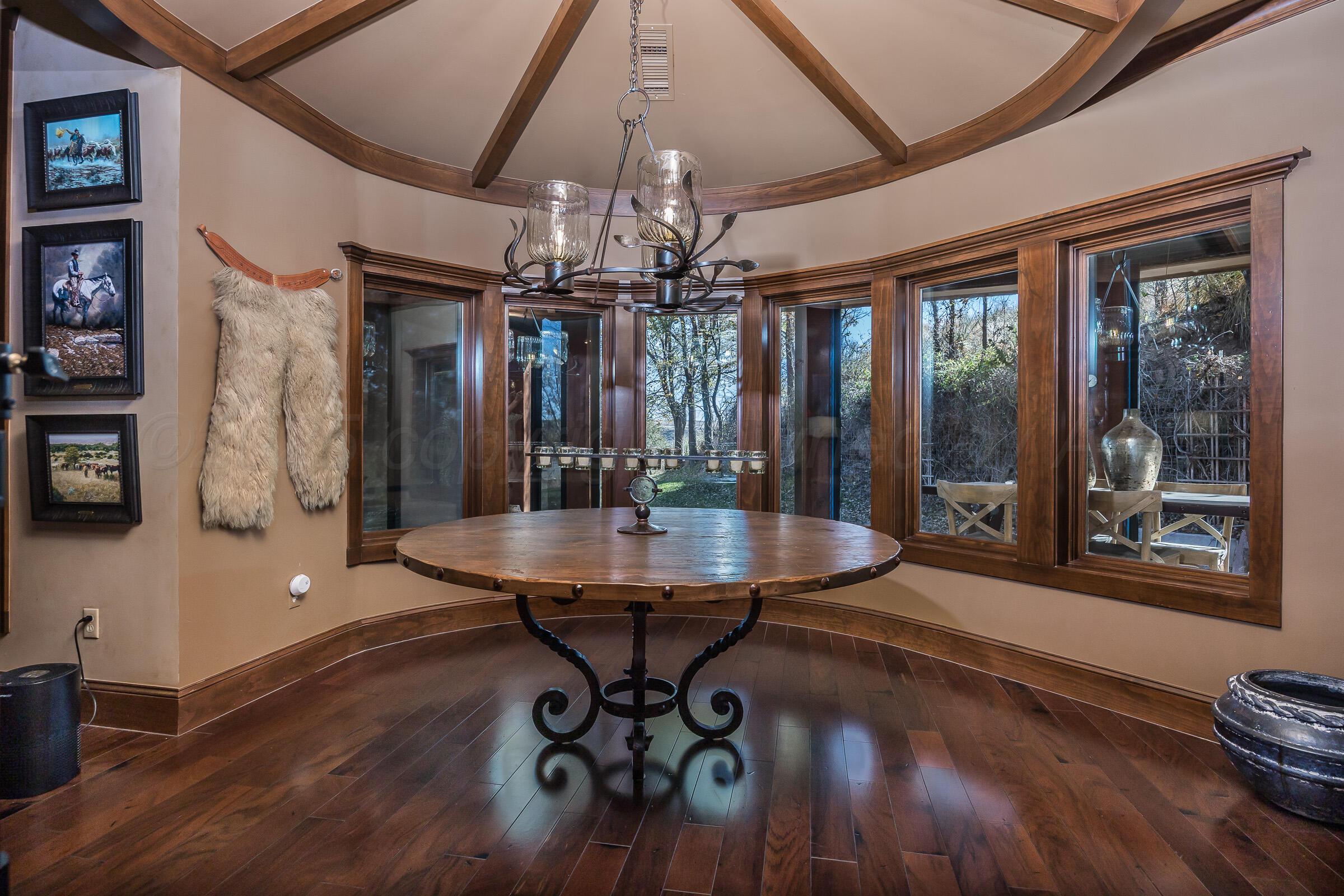 19551 Chaparral Road Canyon, TX 79015 - Photo 17 of 42 a dining room with furniture and window
