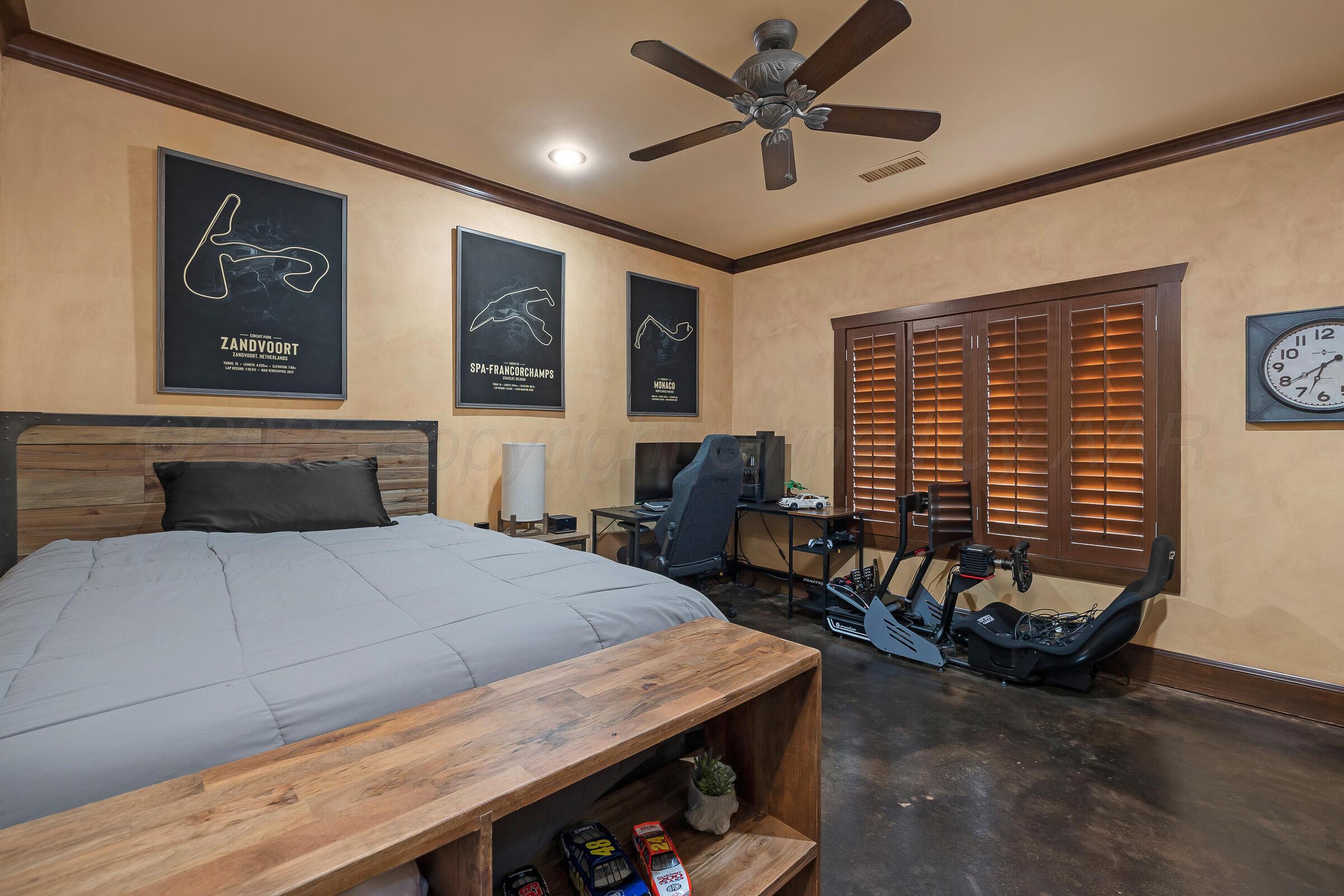 19551 Chaparral Road Canyon, TX 79015 - Photo 29 of 42 a bedroom with a bed and furniture