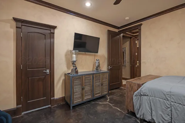 a kitchen with stainless steel appliances granite countertop a refrigerator a stove and a sink with wooden cabinets