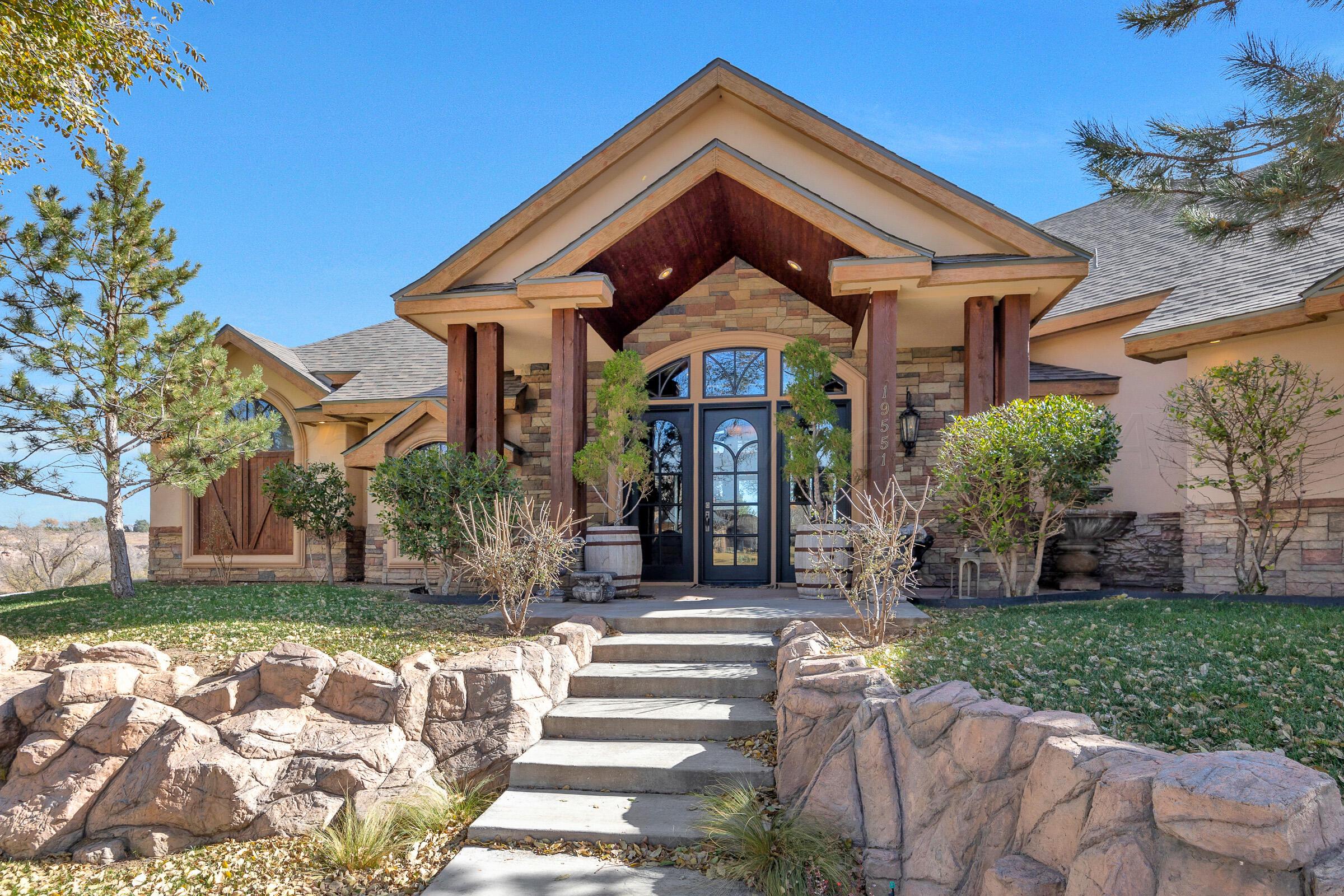 19551 Chaparral Road Canyon, TX 79015 - Photo 3 of 42 a front view of a house with a yard