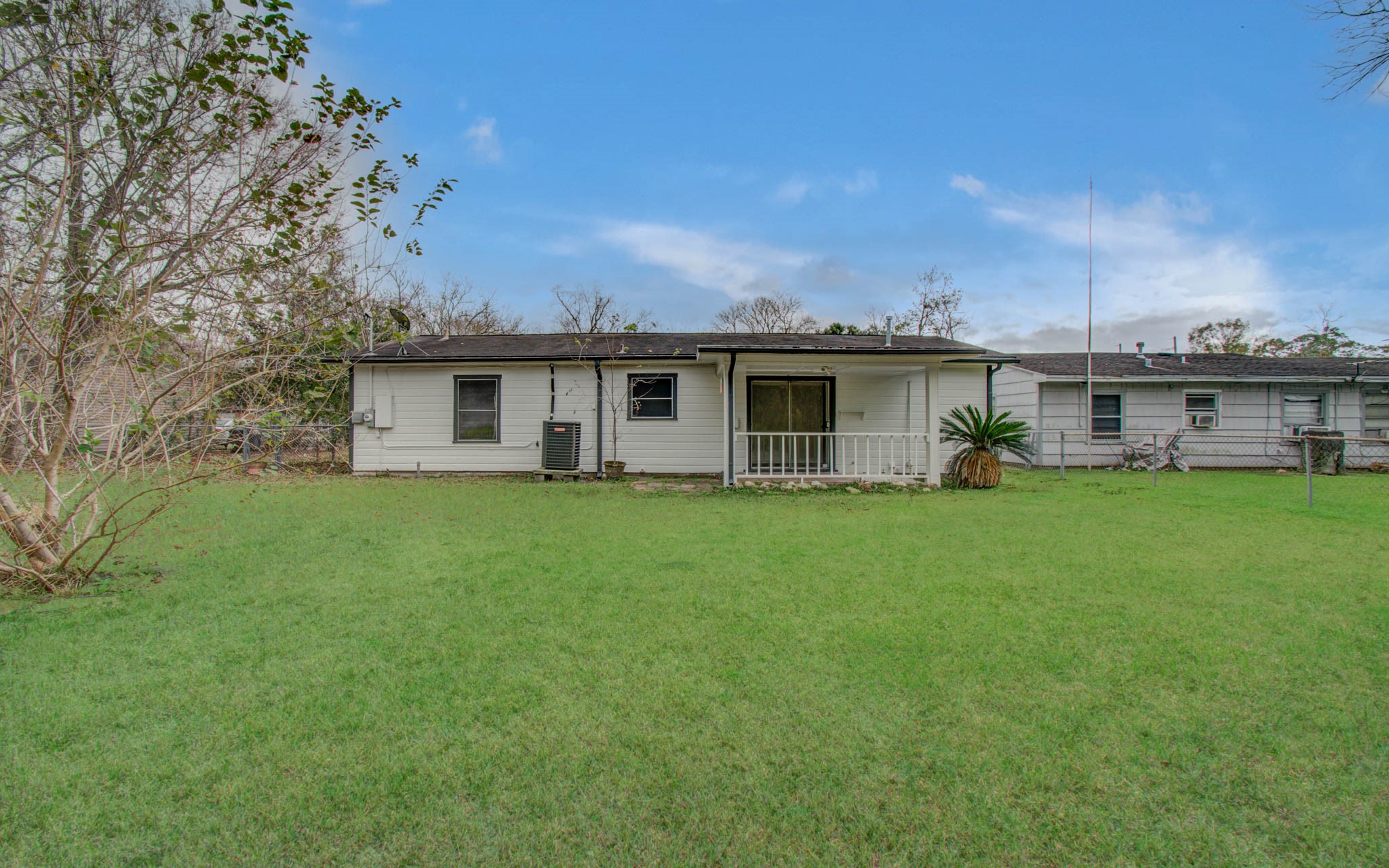 2417 Pecan Street Dickinson, TX 77539 - Photo 41 of 43 a view of a house with a backyard