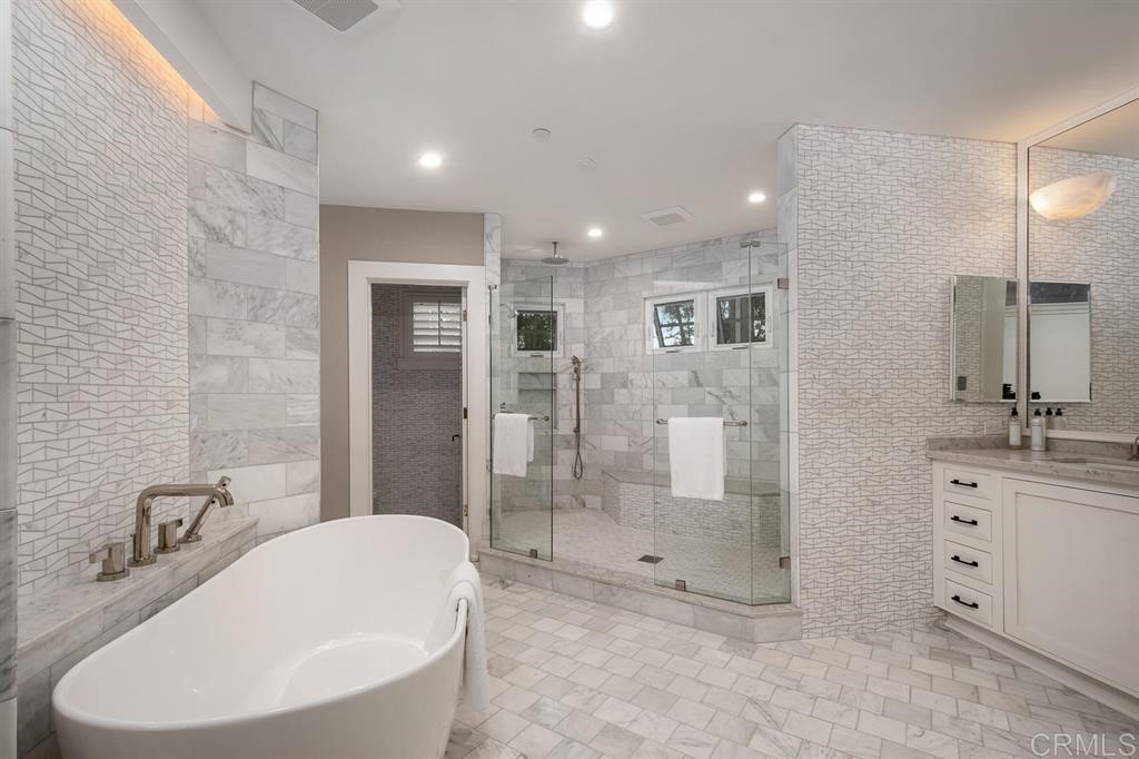 13598 Nogales Drive Del Mar, CA 92014 - Photo 12 of 21 a bathroom with a double vanity sink mirror and shower