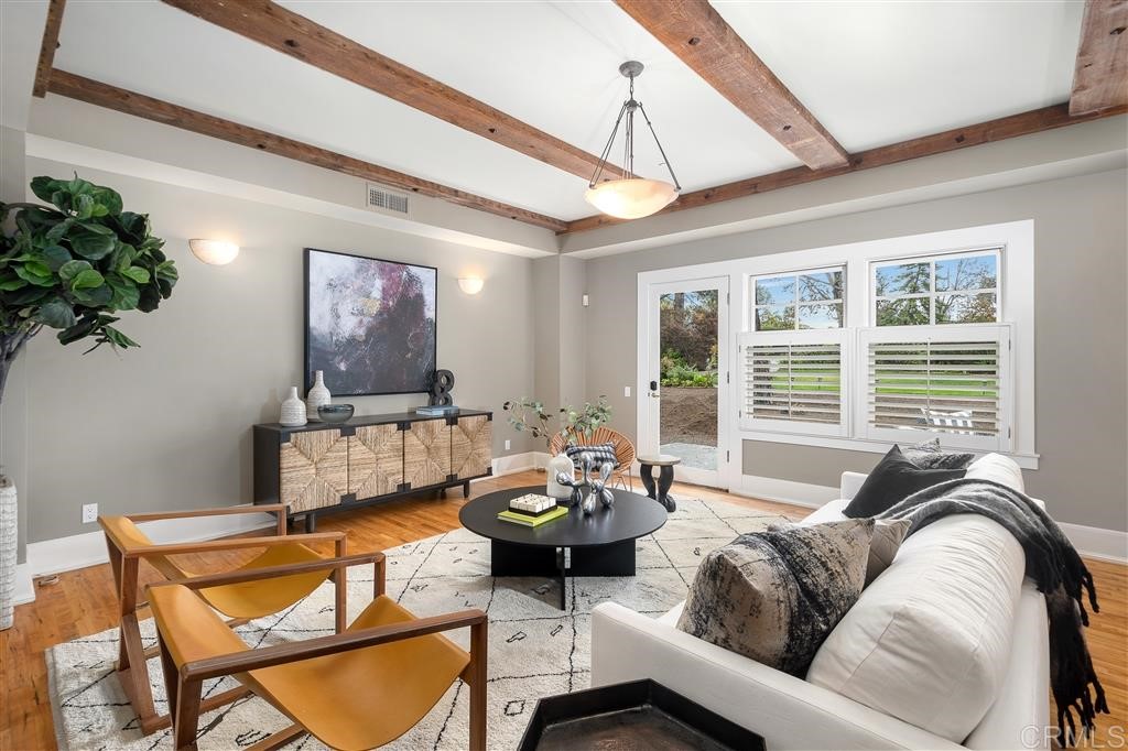 13598 Nogales Drive Del Mar, CA 92014 - Photo 9 of 21 a living room with furniture and a large window
