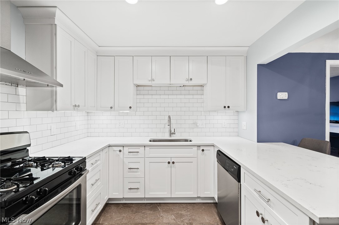 4536 Mackall Road South Euclid, OH 44121 - Photo 3 of 23 Kitchen boasts ample storage space.