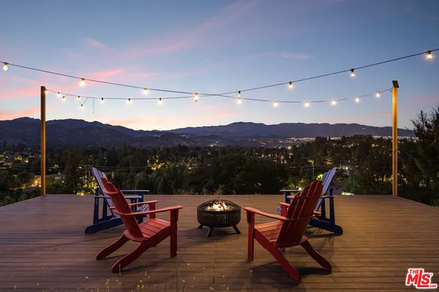 a view of a terrace with sitting area