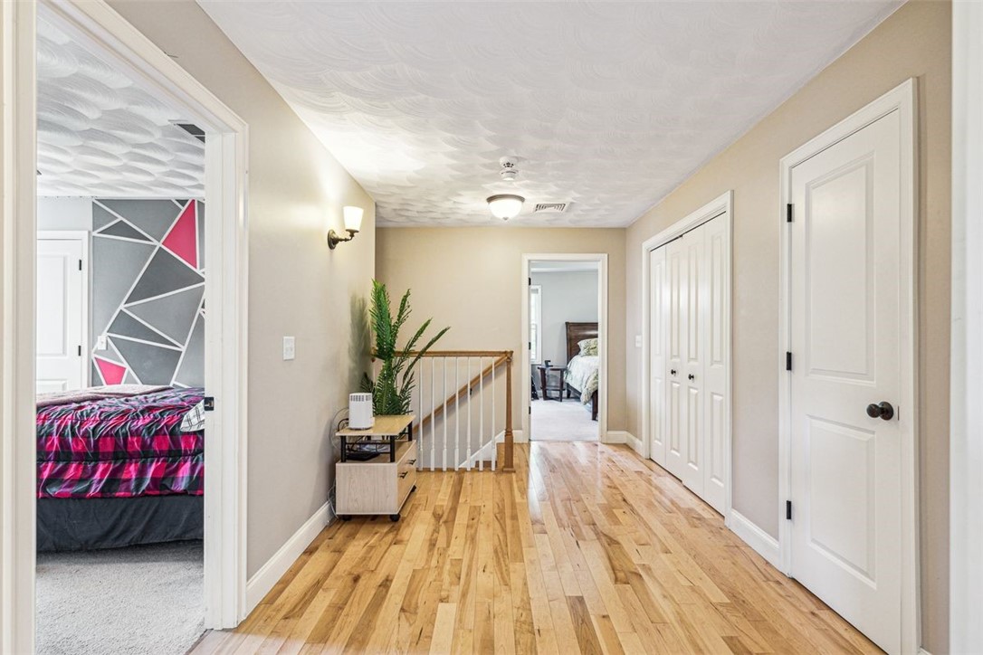 25 Shannon Road Exeter, RI 02822 - Photo 17 of 43 Upstairs hall with laundry to the side