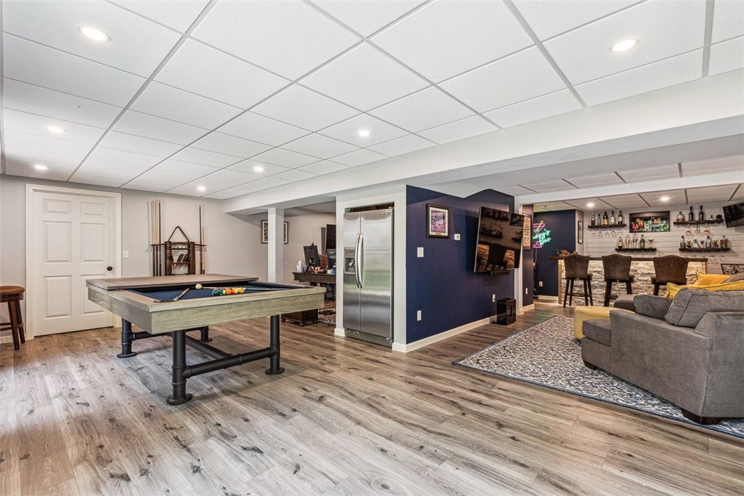 25 Shannon Road Exeter, RI 02822 - Photo 36 of 43 Another section of the entertainment space in the walk out