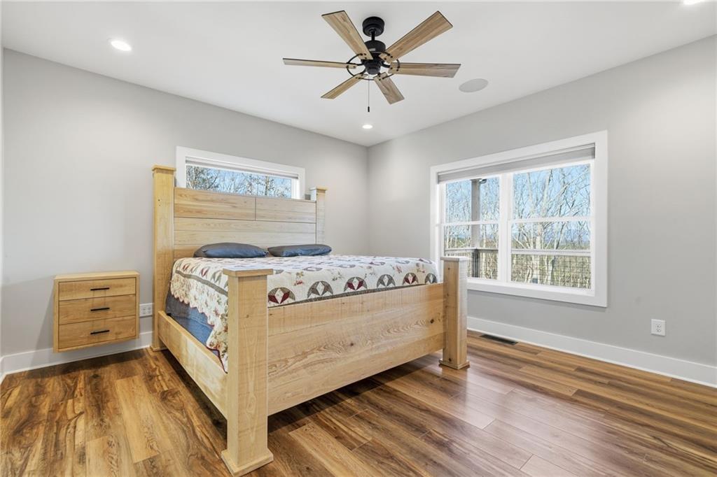 171 Hawthorne Hill Road Jasper, GA 30143 - Photo 30 of 51 a bedroom with a bed and a dresser