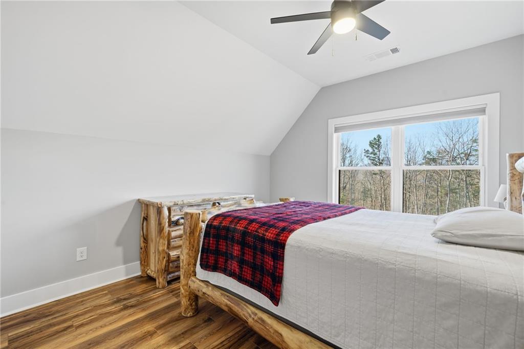 171 Hawthorne Hill Road Jasper, GA 30143 - Photo 42 of 51 a bedroom with a bed and window