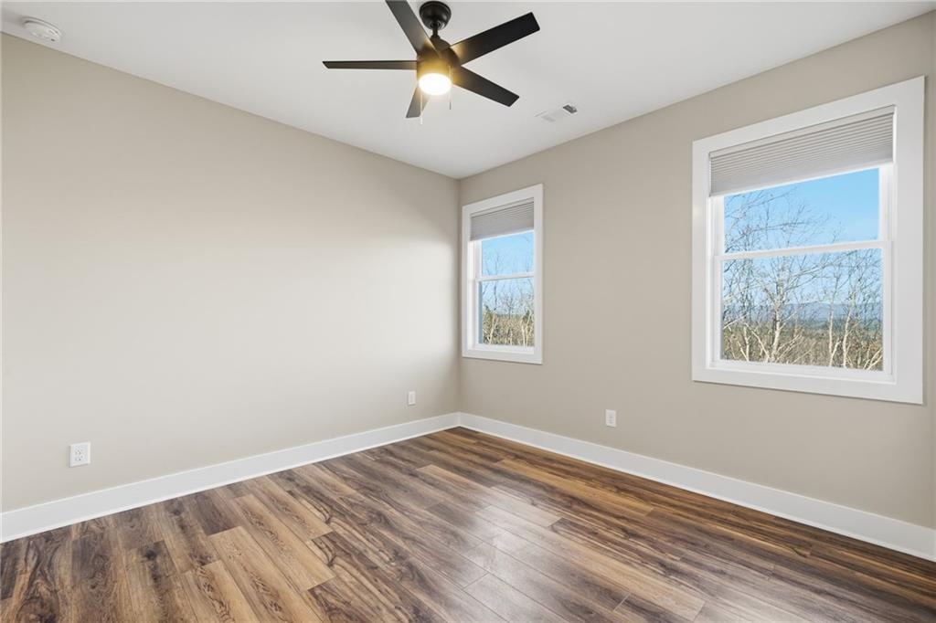 171 Hawthorne Hill Road Jasper, GA 30143 - Photo 43 of 51 a view of empty room with wooden floor