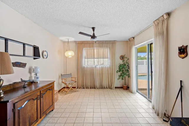 a bathroom with a sink and a window