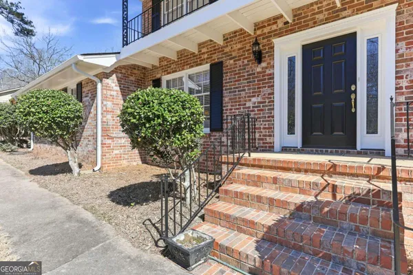 a view of a house with a patio