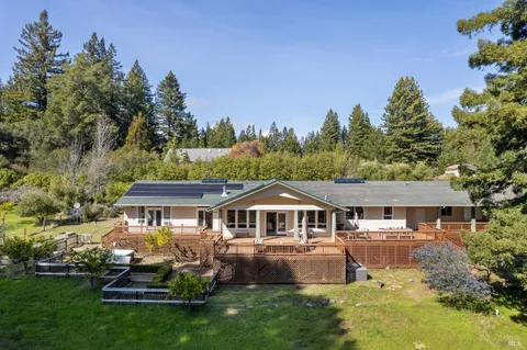 a house with trees in front of it