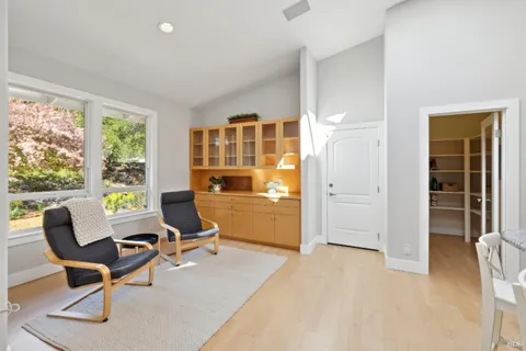 a bath tub sitting next to a window