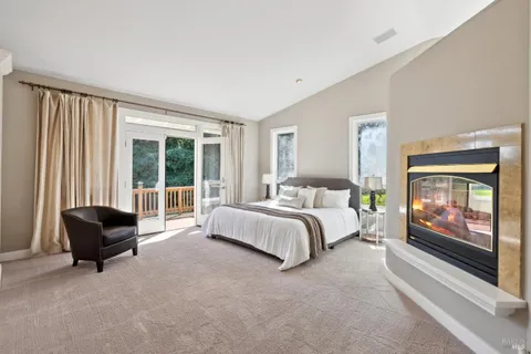 a bathroom with double vanity sink and a mirror