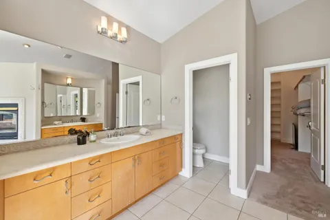 a view of a field with sitting area