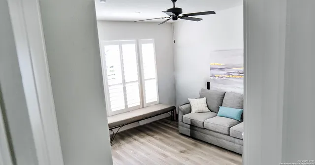 a view of a dinning table and chairs in patio